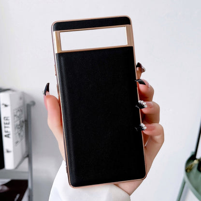 Genuine leather phone case with black front cover and camera cutout, held in hand