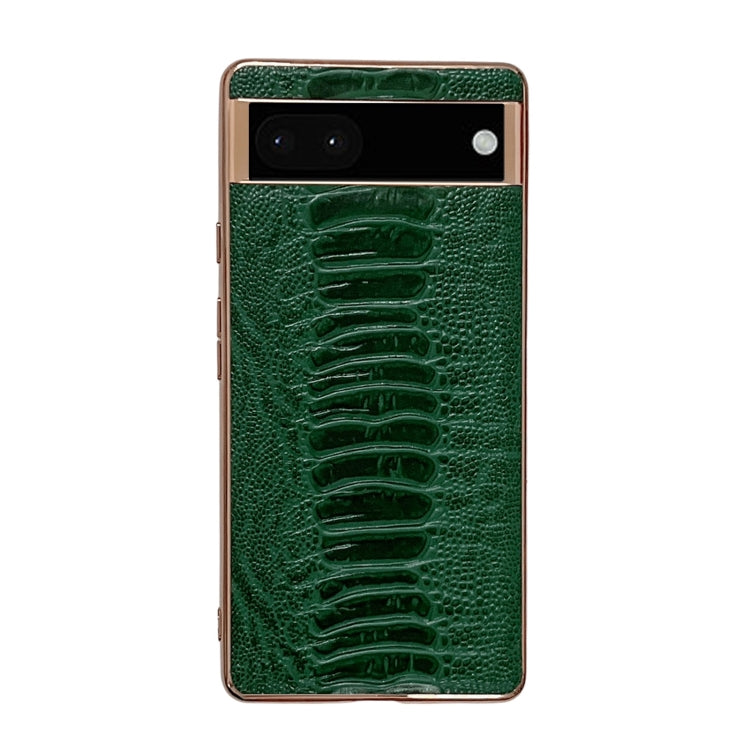 Green leather phone case with embossed alligator pattern, camera window