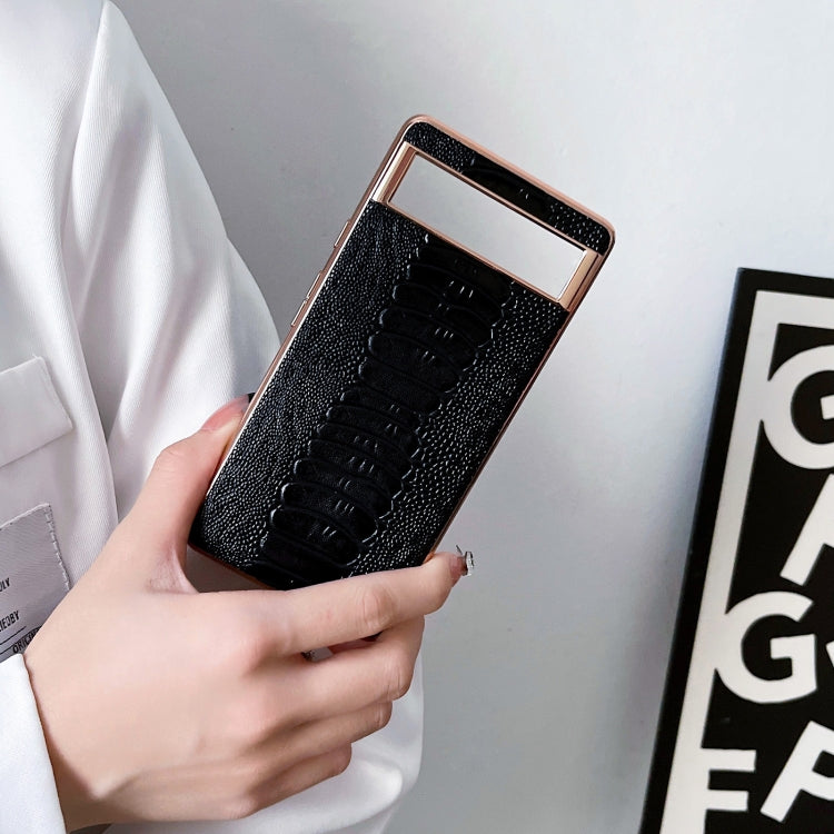 Genuine leather phone case, black textured finish with rose-gold edge