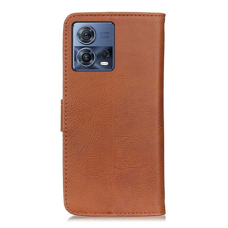 Brown leather flip phone case with camera cutout on the back.