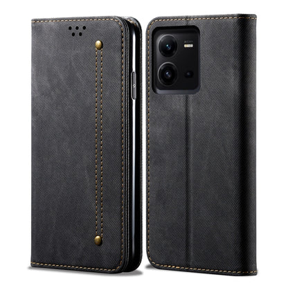 Denim-textured leather folio phone case, dark gray, stitched trim, camera cutout