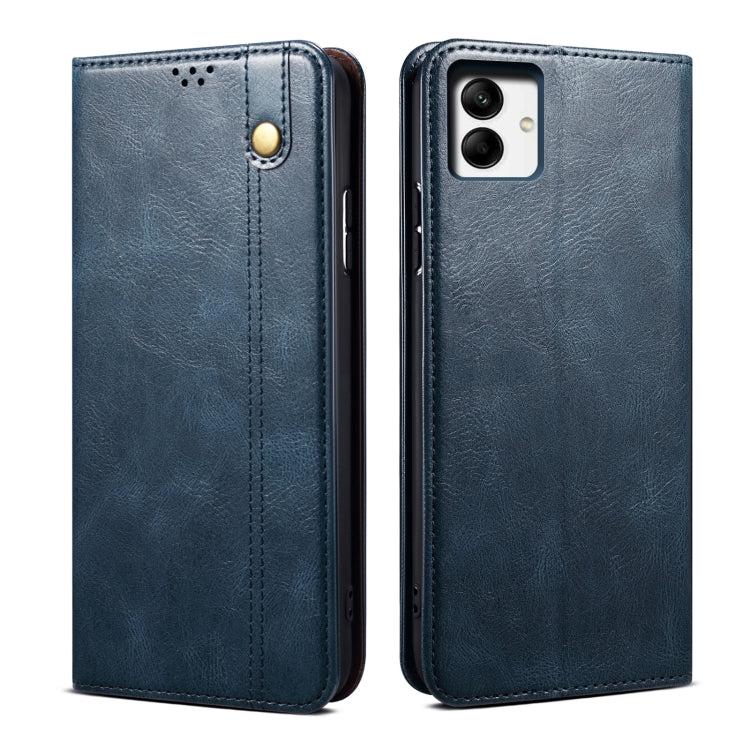 Blue leather flip phone case with front tab and camera cutout on back