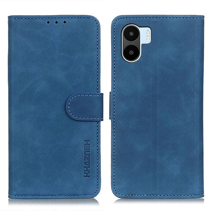 Blue leather folio phone case with flip cover, strap tab, and camera cutout