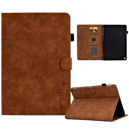 Embossed smile tablet leather case in brown with folio stand and magnetic flap