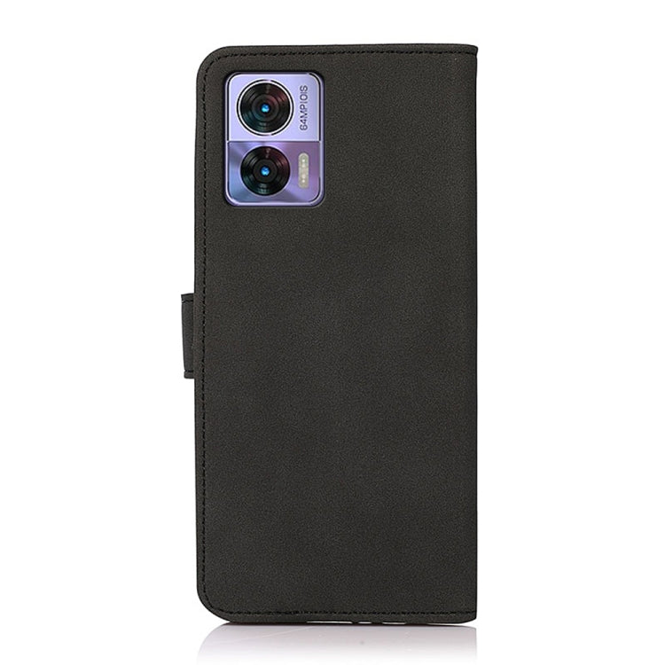 Black matte leather phone case with camera cutout and stitched side strap