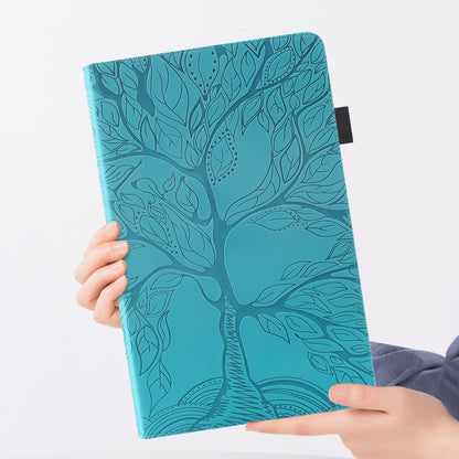 Turquoise leaf-embossed folio tablet case held in hands, closed cover
