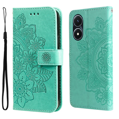 Mint-green embossed leather wallet phone case with flower pattern, magnetic strap, and wrist lanyard.
