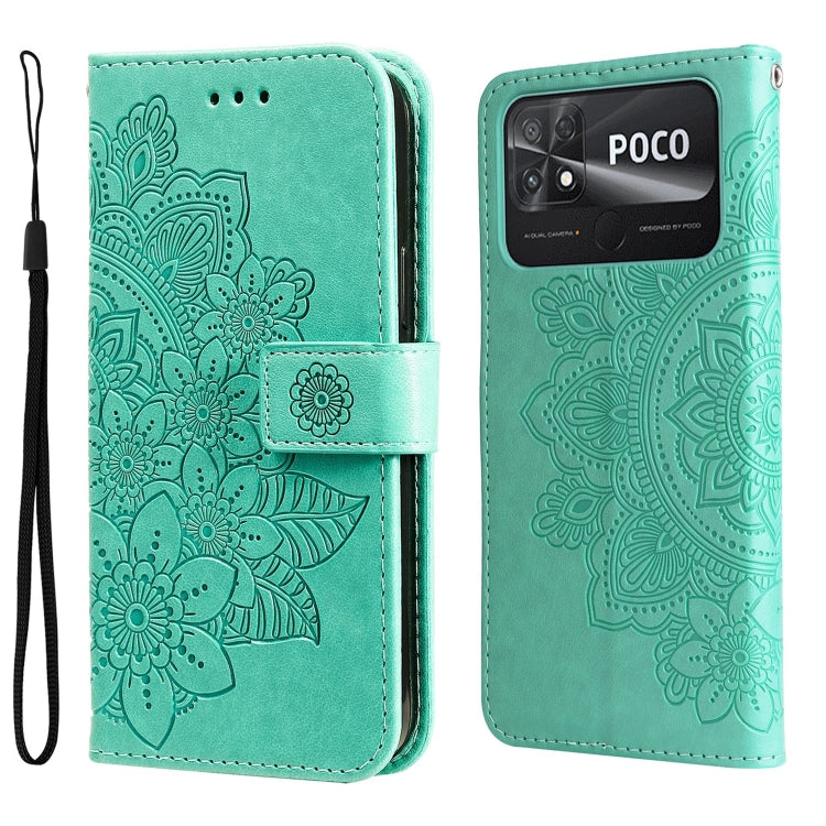 Mint-green embossed leather wallet phone case with floral pattern and visible rear camera window, strap on.