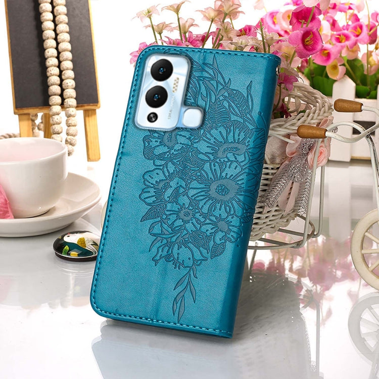 Embossed butterfly flip leather phone case, teal, textured back with camera cutout