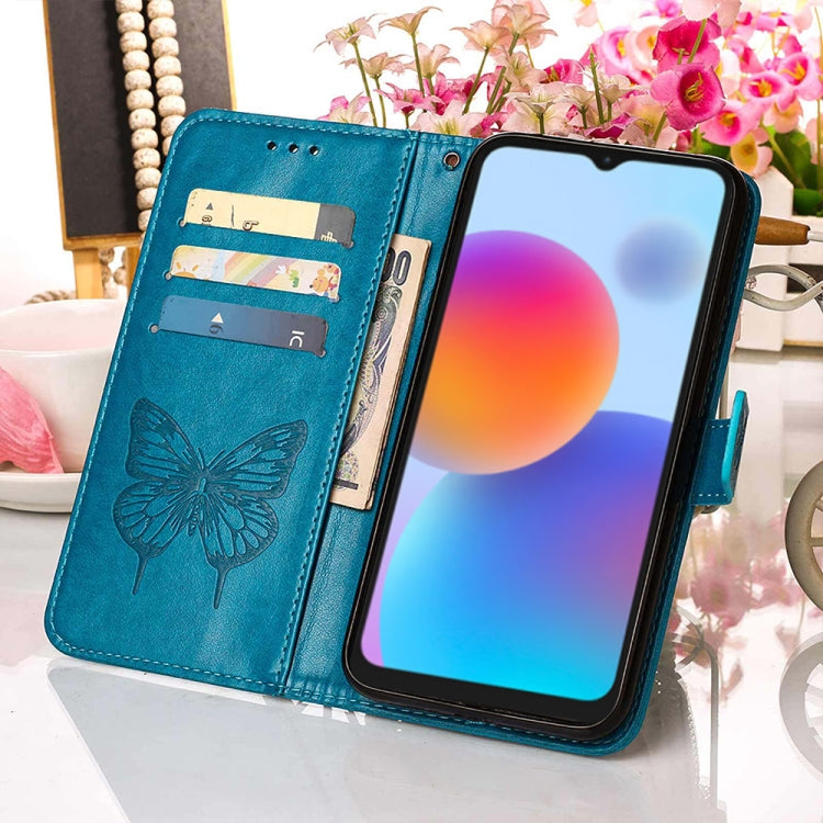 Blue embossed butterfly flip phone case opened, card slots visible