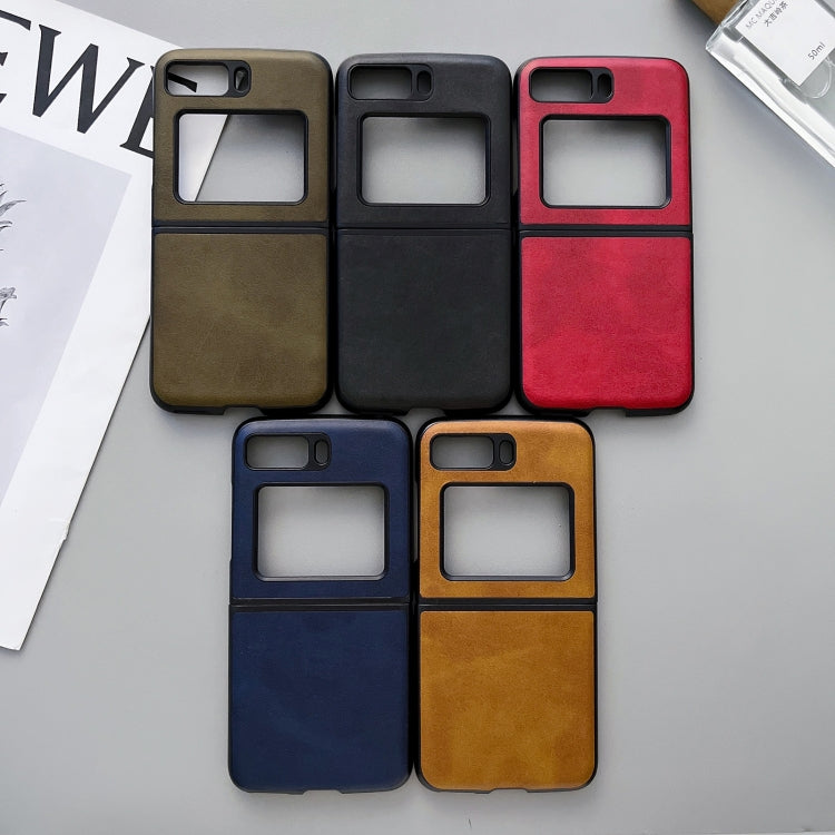 Two-tone leather phone case assortment in black, red, blue, brown, and green colors.