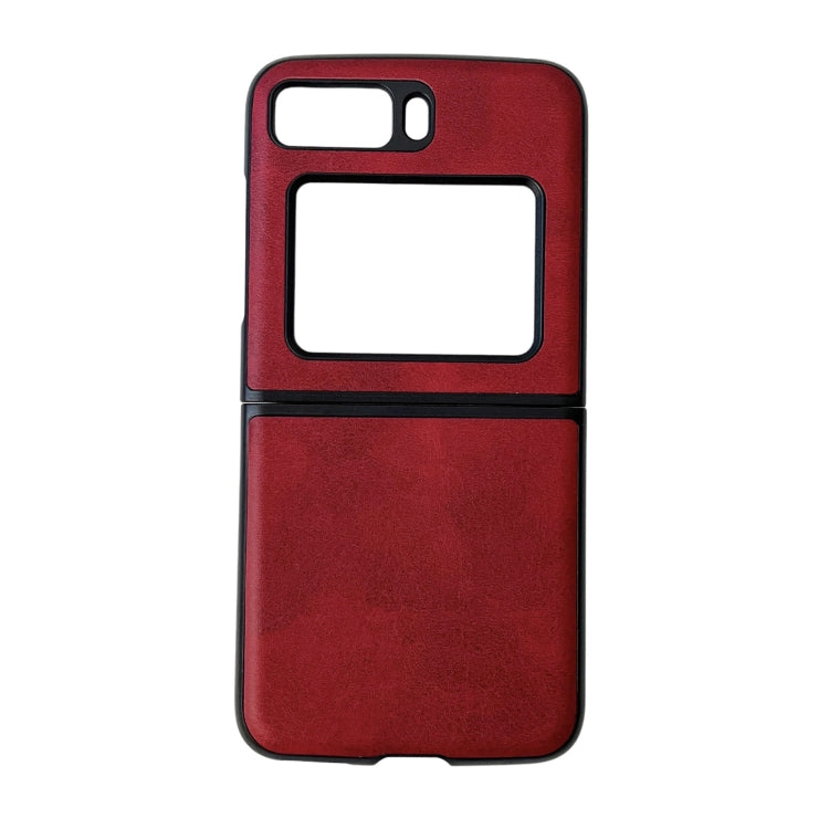 Two-tone leather phone case, red cowhide texture with black trim and window cutouts.