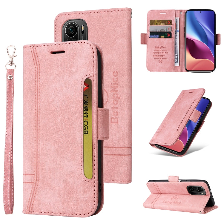 Pink leather phone case with dual-side cover and wrist strap, card holder