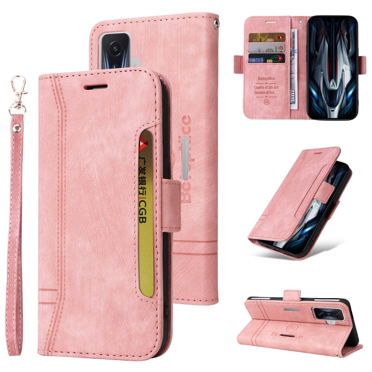 Pink leather wallet phone case with card slots, wrist strap, and flip stand