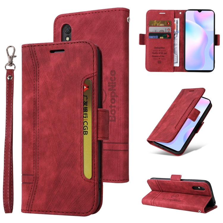 Red leather wallet-style phone case with buckle, card pocket, and wrist strap