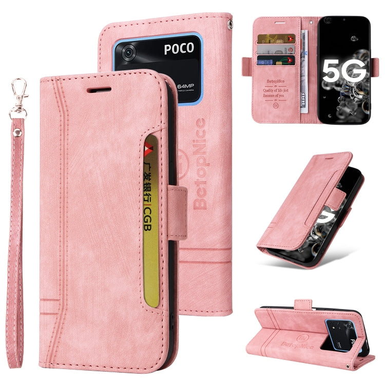 Pink leather phone folio case with wrist strap, side buckle, card slots, and flip stand