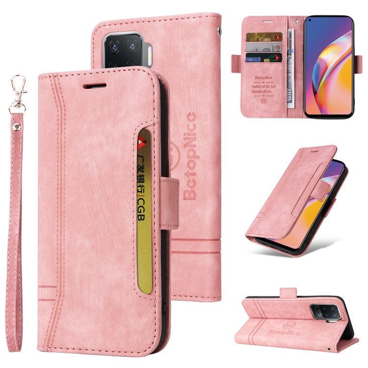 Light pink leather-style flip phone case with side buckle and wrist strap; front and stand views.