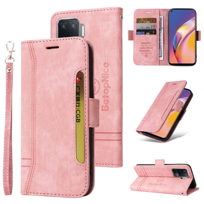 Light pink leather-style flip phone case with side buckle and wrist strap; front and stand views.