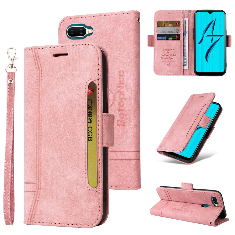 Pink leather-style flip phone case with card slots, magnetic closure, and wrist strap