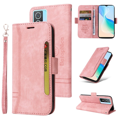 Pink leather phone case with flip cover, card slots, and wrist strap; stand view shown.