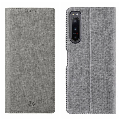 Dark grey shockproof phone case with folio cover and single camera cutout