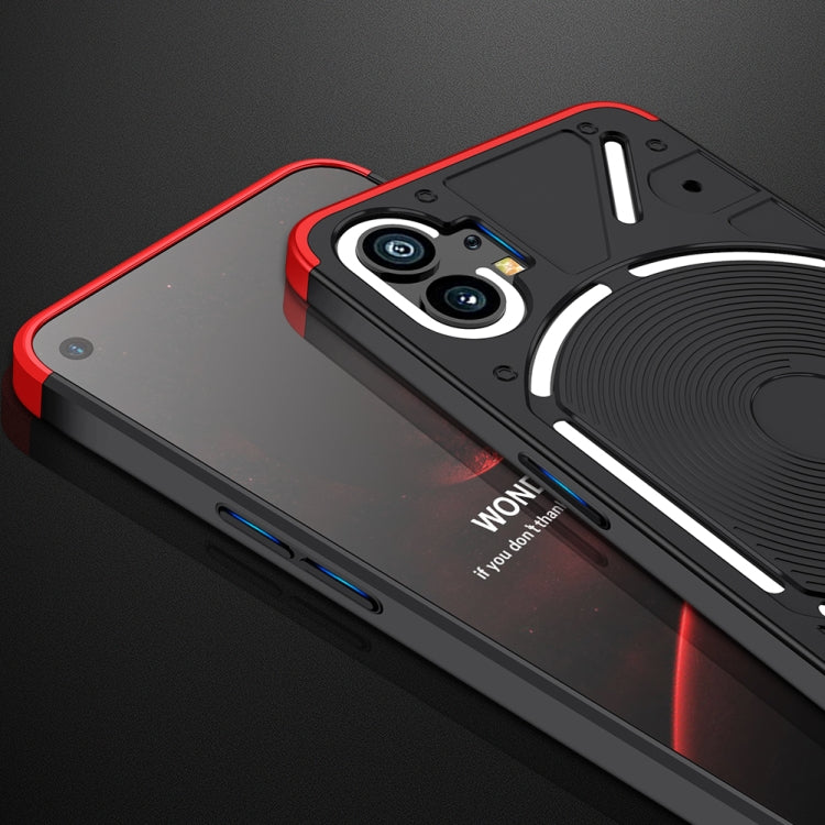 Black phone case with red trim and blue accents; camera cutouts and charging pad