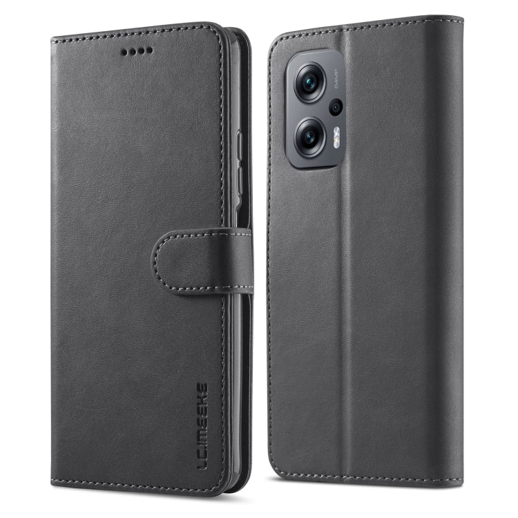 Black leather wallet phone case with flip cover, stitched edges, and camera cutouts.