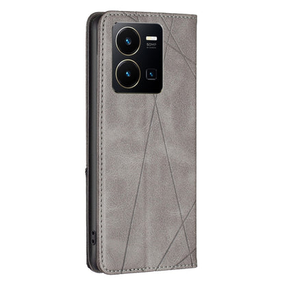 Grey leather phone case with camera cutout and geometric panel, magnetic folio cover.