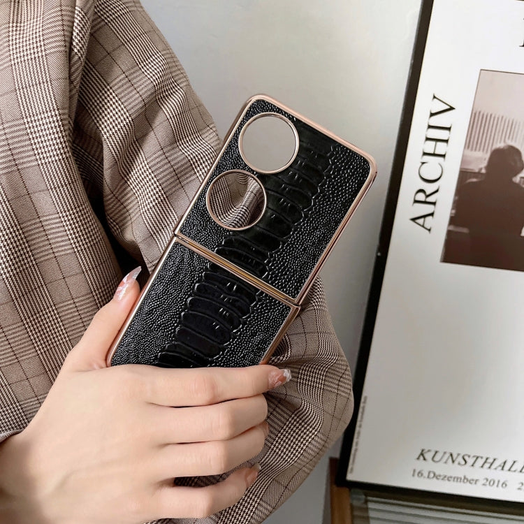Black croc-texture phone case with camera cutout and two metal rings