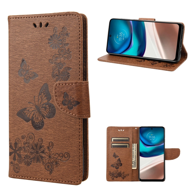 Brown butterfly embossed flip leather phone case with card slots and magnetic strap.