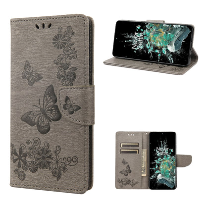 Gray butterfly embossed flip leather phone case, folded for viewing with stand