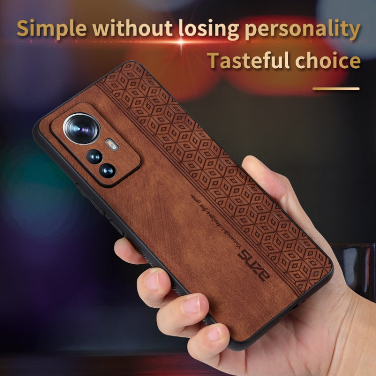 Brown embossed phone case held in hand for Xiaomi 12 Pro/12S Pro, camera cutouts