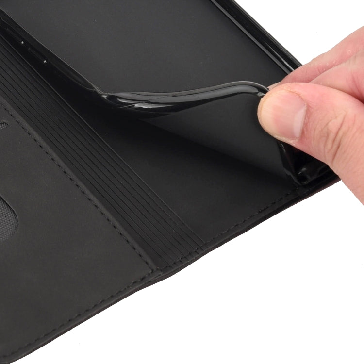Black leather folio case interior with ridged card slot and fold lining