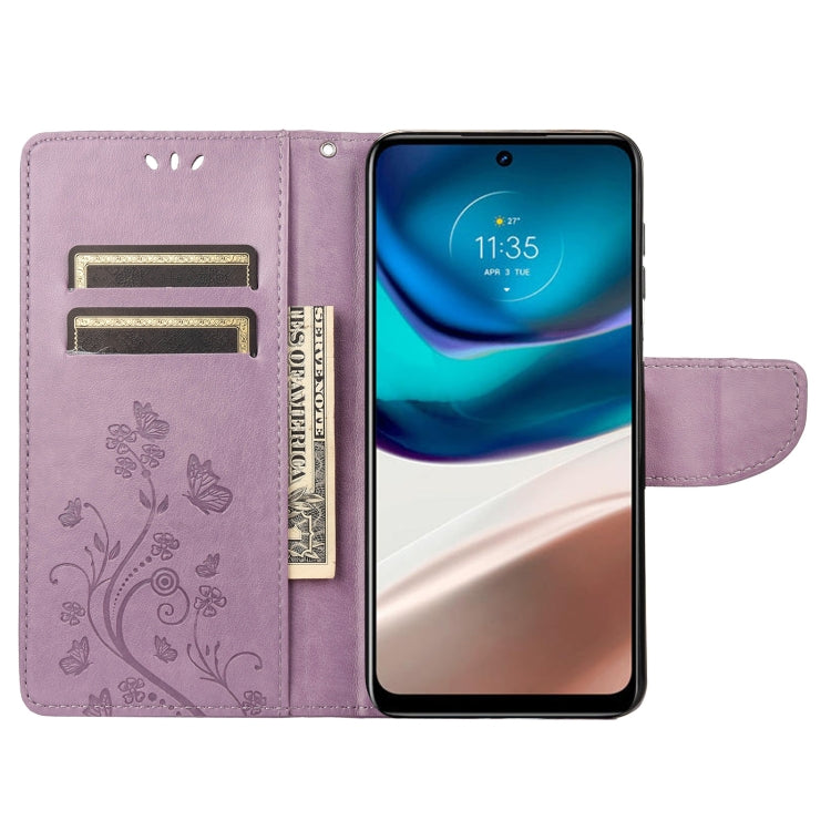 Light purple flip phone case with card slots, butterfly pattern, holding a phone.