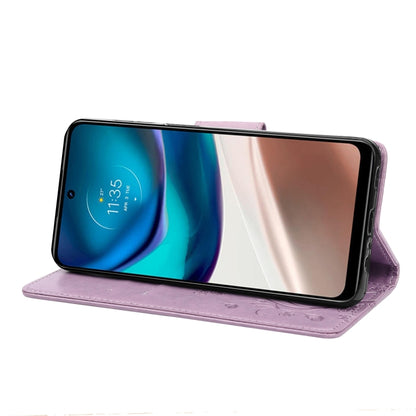 Light purple flip phone case standing mode, butterfly pattern on the front flap.
