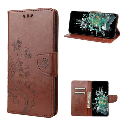 Brown flip leather phone case with butterfly flower pattern, card holder and stand