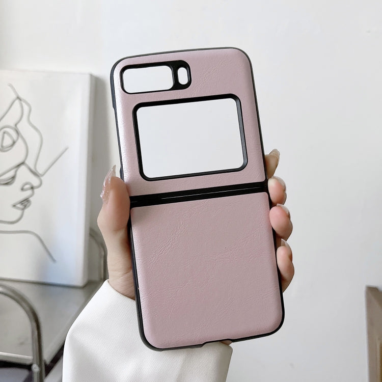 Pink cowhide-texture PU phone case with camera cutout; grippy cowhide-style finish