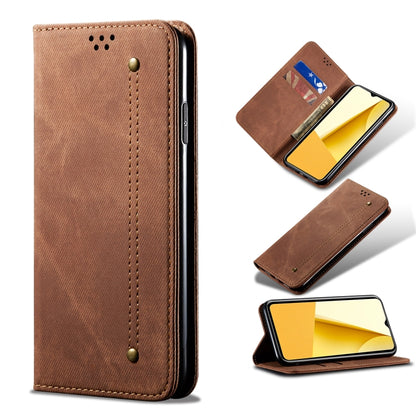 Tan leather wallet phone case with card slot window, stitched edges, and magnetic button