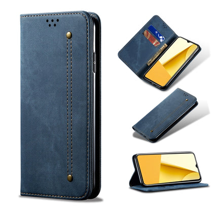 Blue leather wallet phone case with card slot window, stitched trim, and magnetic button