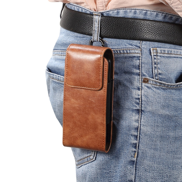 Brown lambskin leather phone waist bag with flap and metal carabiner, worn on belt