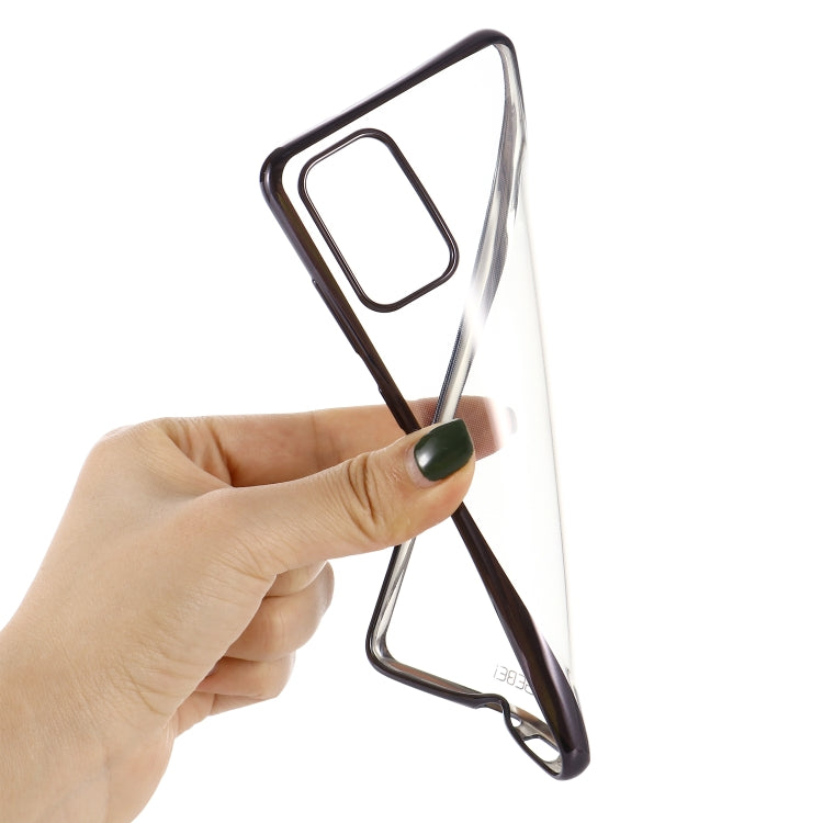 Transparent TPU shockproof case with plated bumper, held in hand