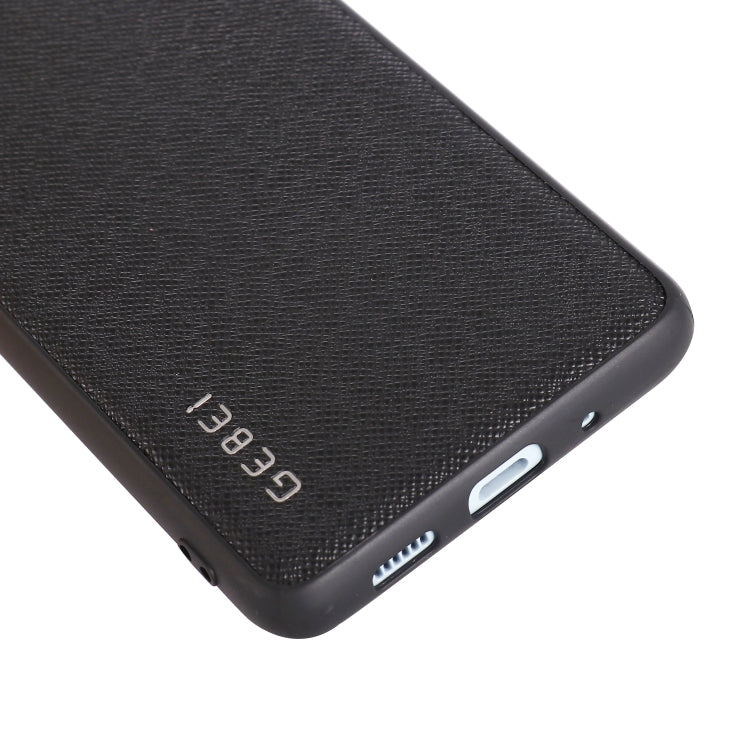 Shockproof leather phone case corner close-up, black with speaker/charging cutouts.