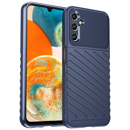 Dark blue TPU phone case with ribbed pattern and triple camera cutouts.