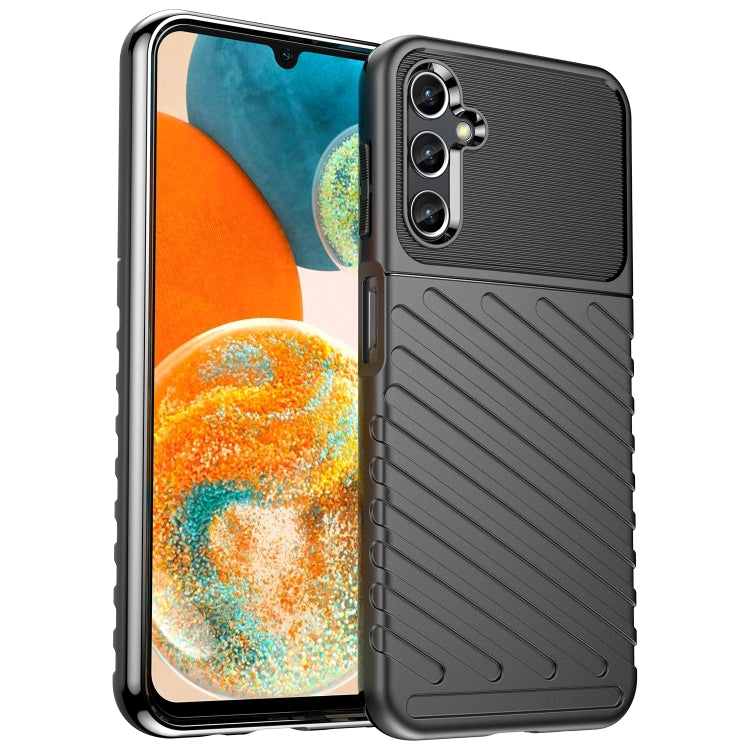 Dark blue TPU phone case with ribbed back and triple-lens camera opening.
