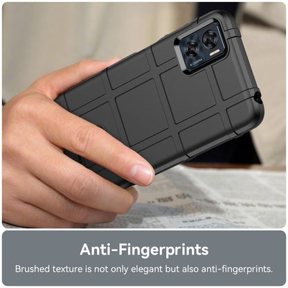Black rugged TPU phone case with camera and tactile grip texture, held in hand.