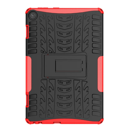 Red and black tire-texture tablet case with kickstand panel and holder strap