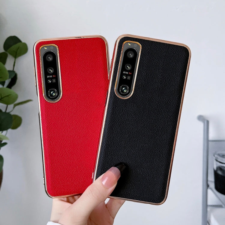 Genuine leather phone case, red and black, slim fit with dual camera cutouts