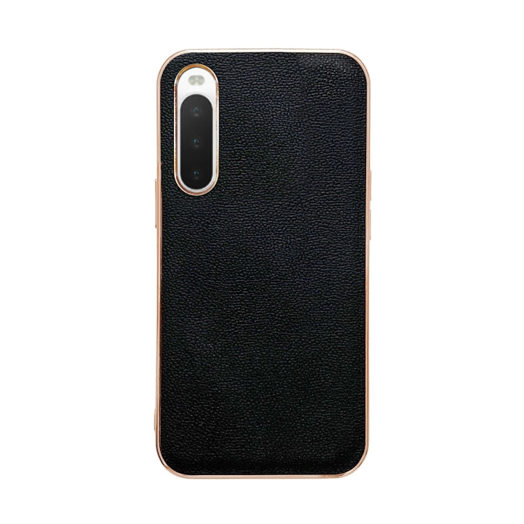 Black leather phone case with smooth textured finish; single camera module cutout.