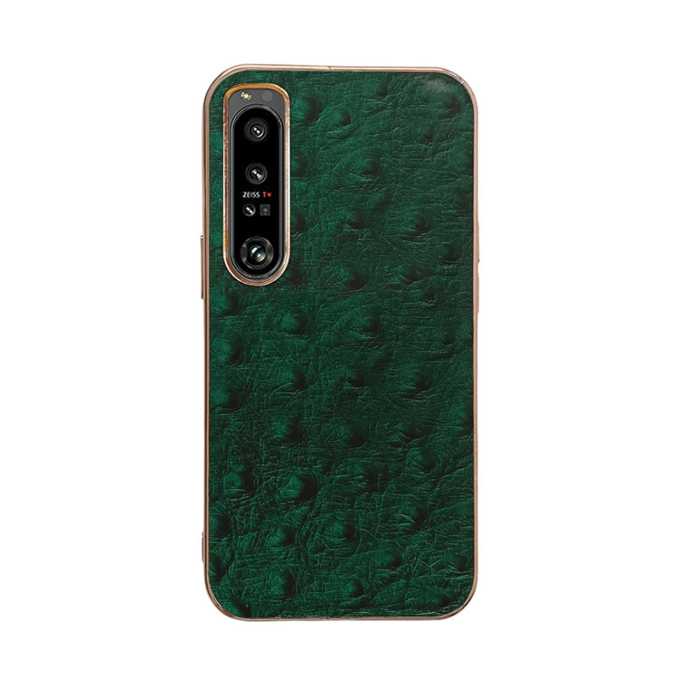 Green ostrich-textured leather phone case with dual camera cutouts