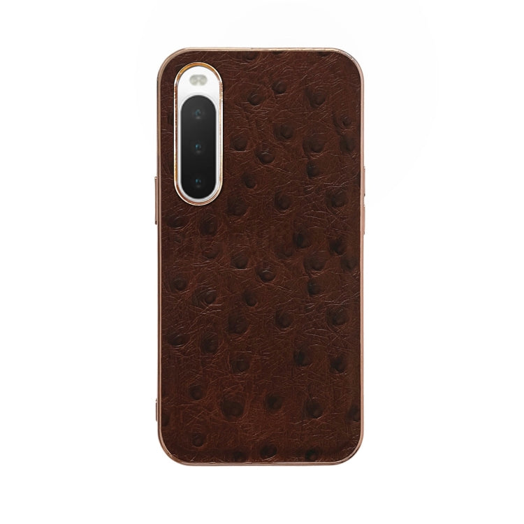 Coffee brown ostrich-textured leather phone case with raised lens frames